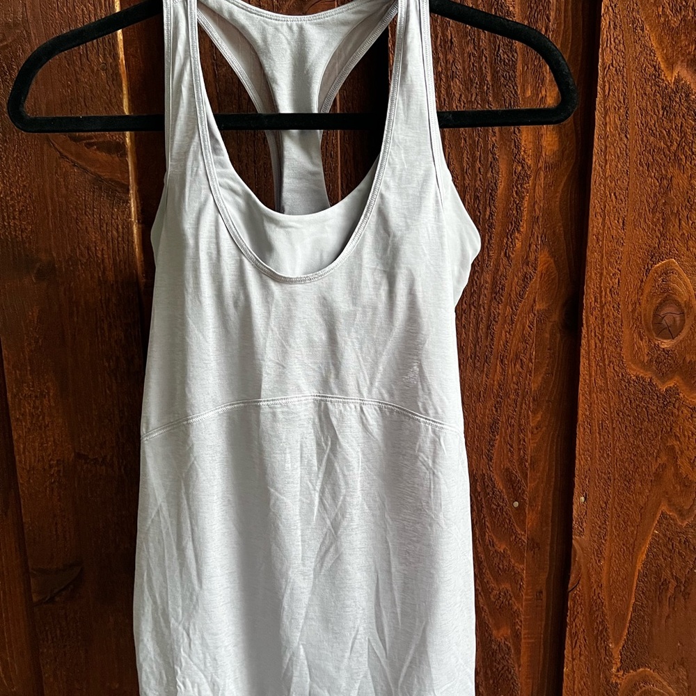 Lululemon Athletica White Tank Top sport bra is attached.